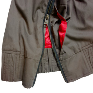 Mens luxury fashion grey track jacket front view red lace and red slick lining side view zipper and pocket