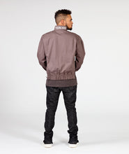 Load image into Gallery viewer, Male mode Mens wearing jeans and luxury fashion grey track jacket front view red lace and red slick lining back view